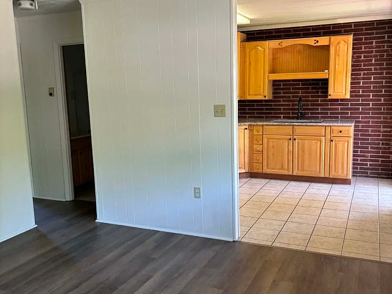 Living room looking into kitchen