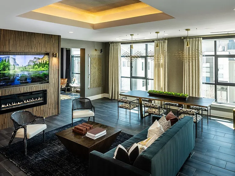 Lounge with fireplace and TV