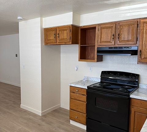 Nice kitchen. New Refrigerator, stove, counter top, and floors
