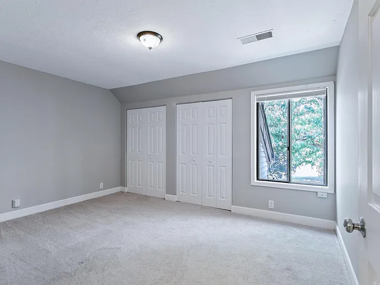 one of three second floor bedrooms