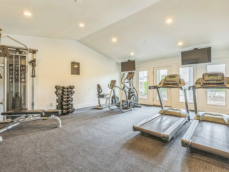 Stay active in our spacious fitness center featuring treadmills, free weights, and complete exercise equipment, professionally operated by Highlands Vista Group.