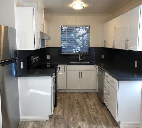 Remodeled Kitchen with New Tile Floor and new appliances