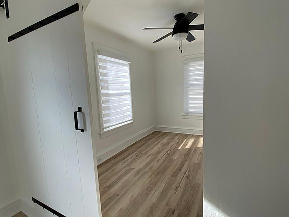 Area between living and bedroom w/barn door.