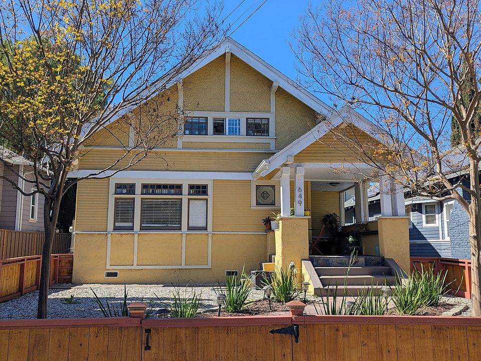 This is a duplex unit. The listing is for the converted attic space upstairs. Both units are currently occupied.