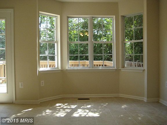 NEW 12x12 CERAMIC FLOORS IN KITCHEN