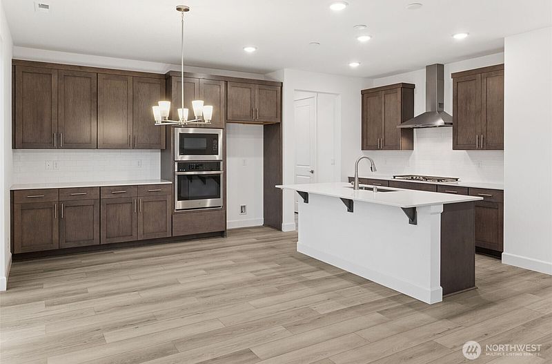3rd image of 10637 Treasure Drive NW #121