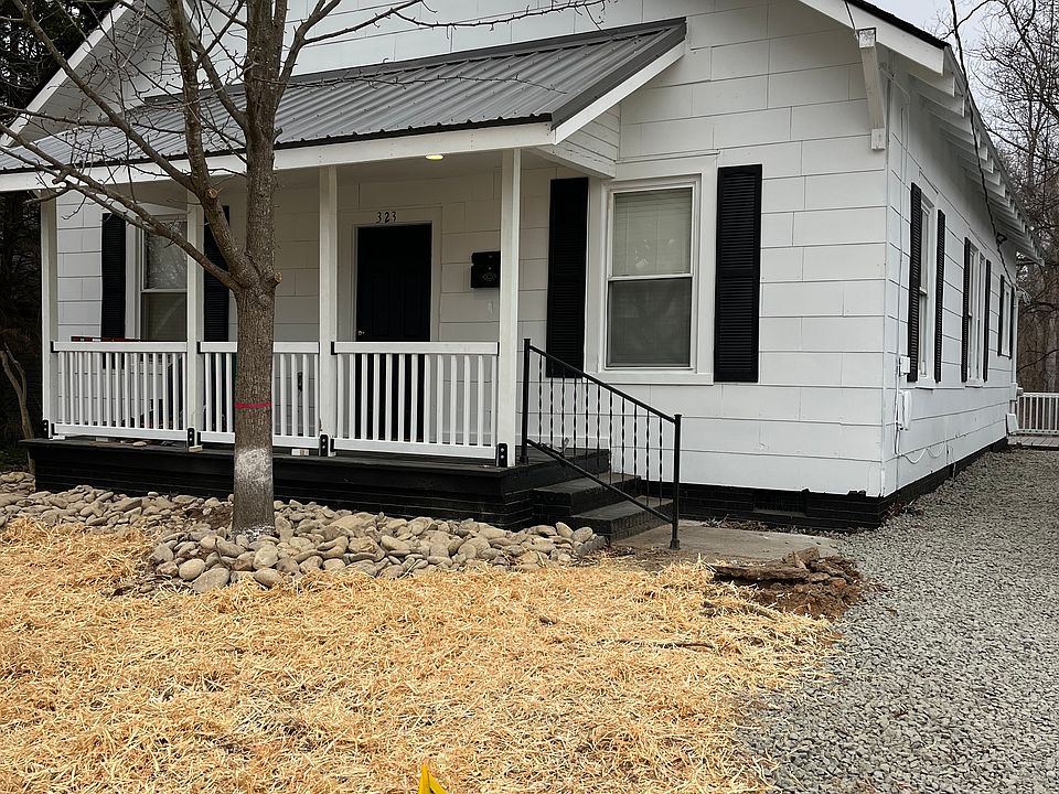 323 Caldwell avenue. New gravel driveway,. Newly remodeled interior; all new recessed lighting, ceiling fans in all bedrooms, 10' ceilings, new kitchen cabinets and new quartz countertops, new lvp flooring and new paint throughout