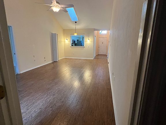 living/dining area, vaulted ceilings, skylight.