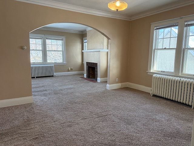 Spacious dining room with interesting architectural detail.