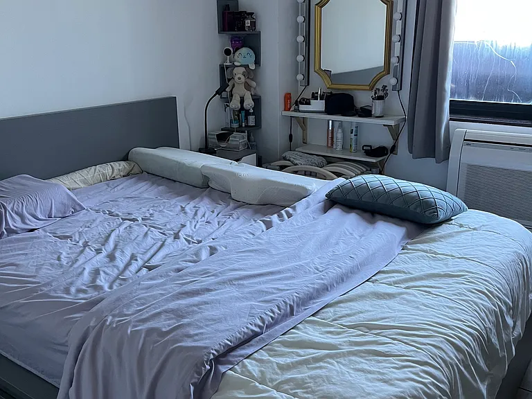 Queen bed and powder corner