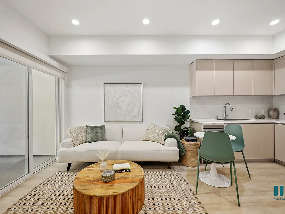 Spacious Patio and Open-Concept Living Room, Dining, and Kitchen