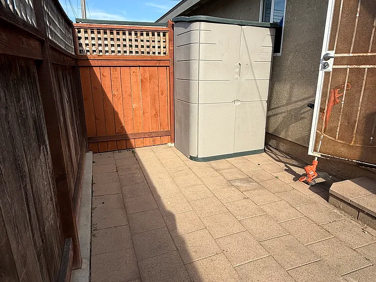 Private backyard with dry lockable storage unit