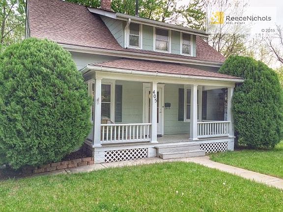 charming front porch with great landscaping