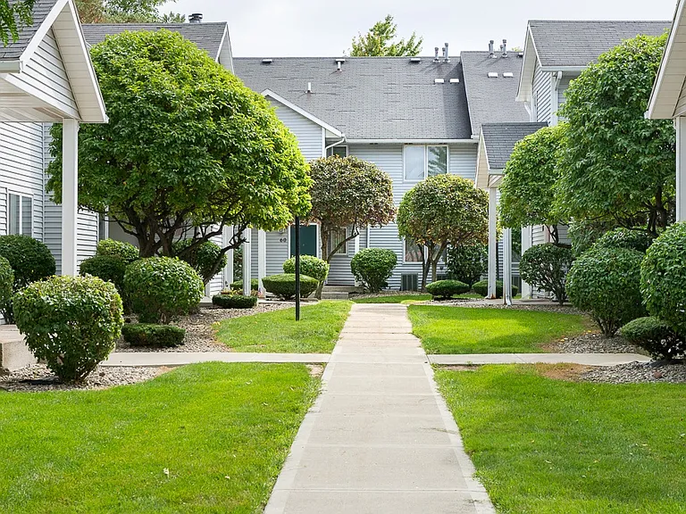 View of Village Walk neighborhood with sidewalks and landscaping
