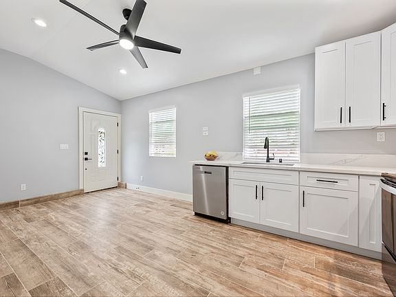 View of living room and kitchen. Everything is brand new. Built in 2025