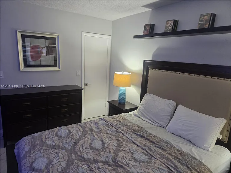 4265 NW South Tamiami Canal Dr #1-208 — Photo 16