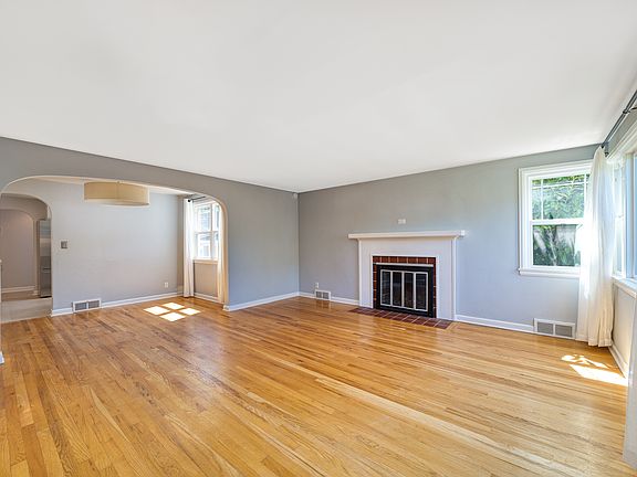 Living Room with Wood-Burning Fireplace