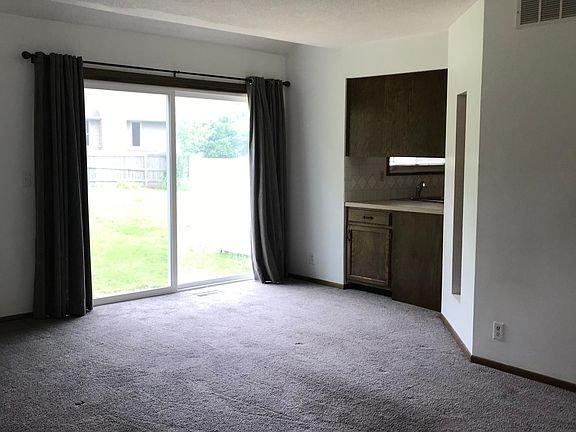 Oversized sliding door off living room.