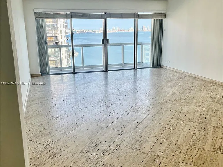 Marble floors with unobstructed view of bay .