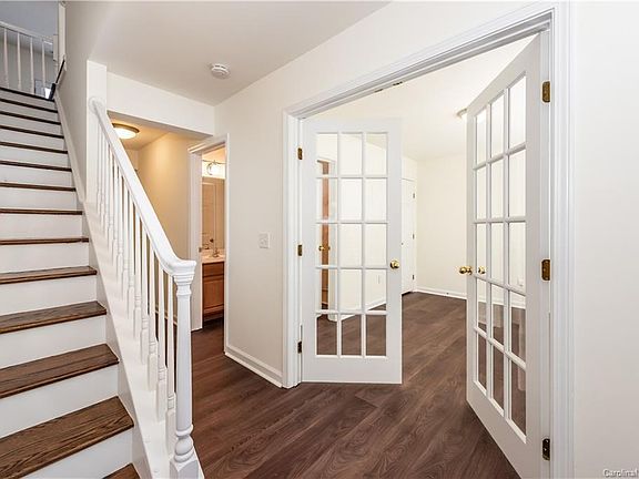 Entry way opens to flex space (formal sitting area/home office/bedroom) and full bathroom