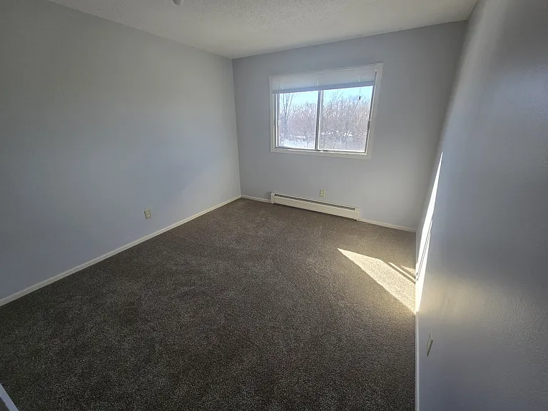 Bedroom Two with new carpet.