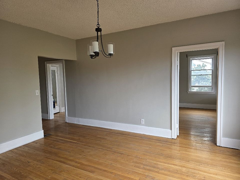 dining room view with room to right as an office or 3rd bedroom