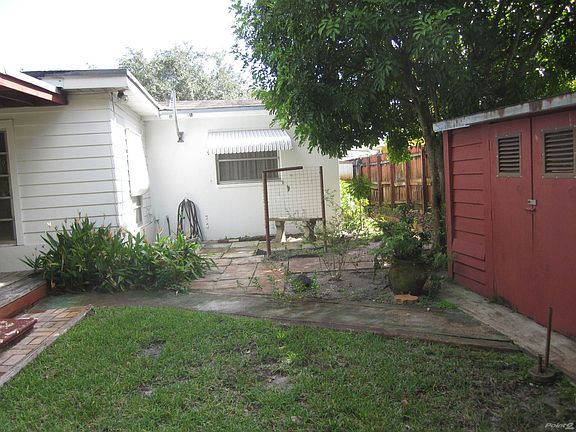 2 sheds on south side of house