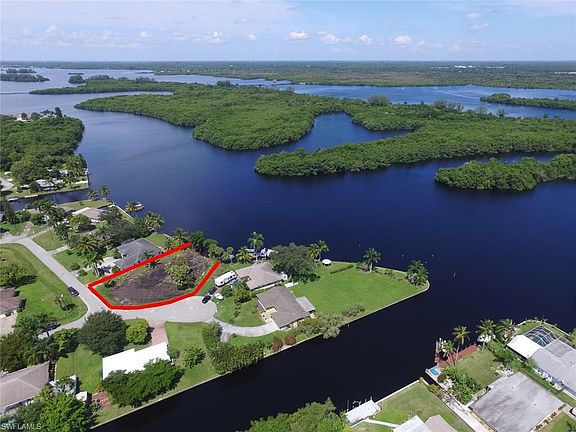 FRESHLY CLEARED, 1/3 ACRE HOME SITE FOR YOUR DREAM WATERFRON HOME.