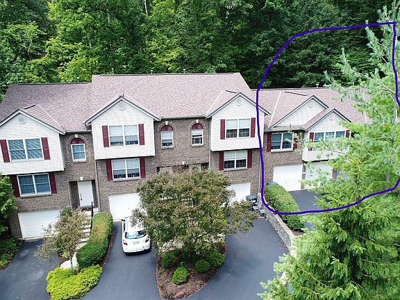 The home is attached to three towns homes. In a lovely secluded section of Loveland.