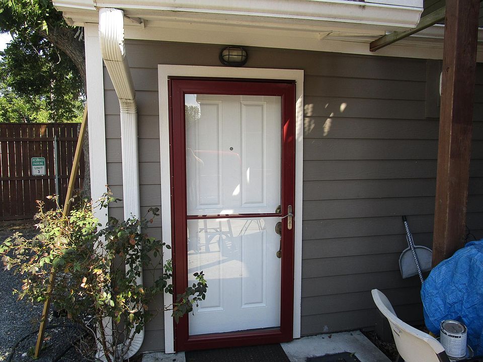Front door. Has storm door that has slide screen for fresh air while still locked.