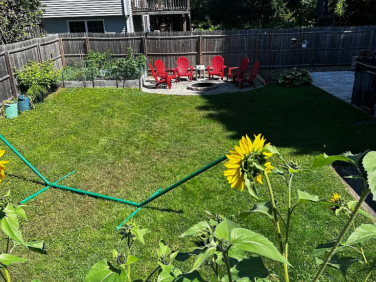Fully Fenced in backyard (with basketball slab and fire pit)
