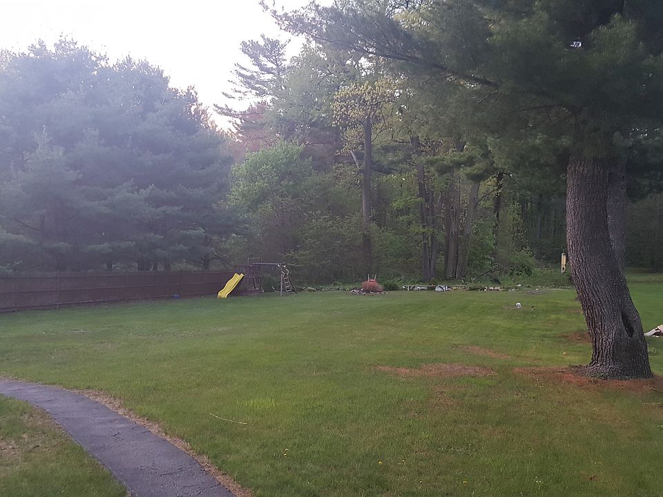 Huge back yard, swing set included! Great for entertaining.
