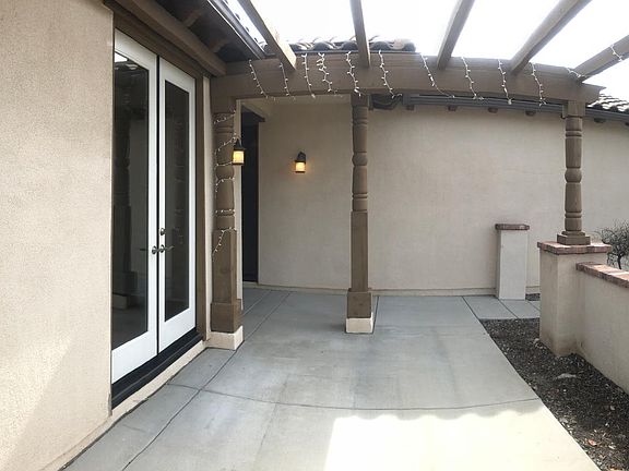 Front area for outside sitting under the patio
