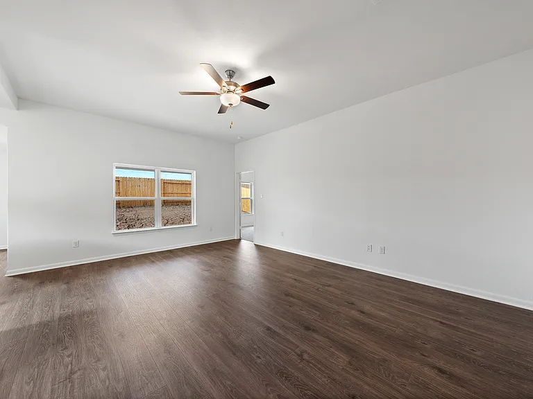 The window in the family room overlooks the backyard.