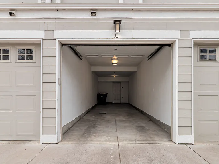 Tandem Garage with extra space for trash/storage