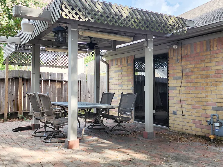 Cover patio with complementary furnished patio table & chairs