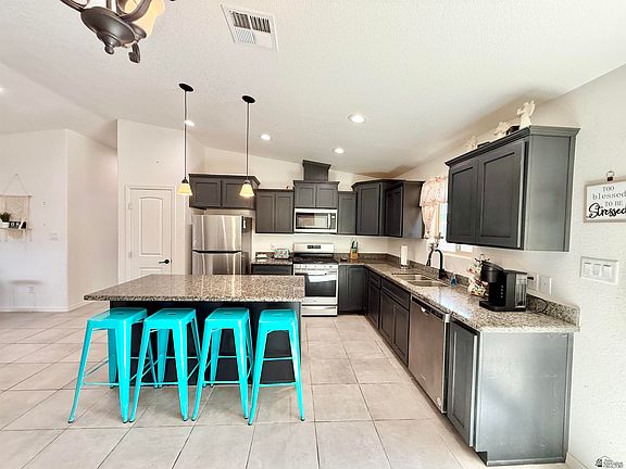 4th image of 11592 E 33rd Ln