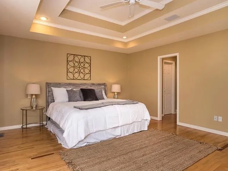 very large primary suite, with two closets