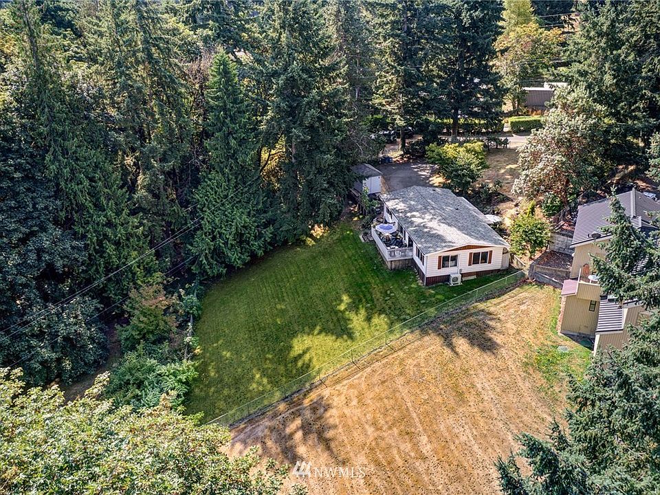Shy half acre private lot in PRIME location!