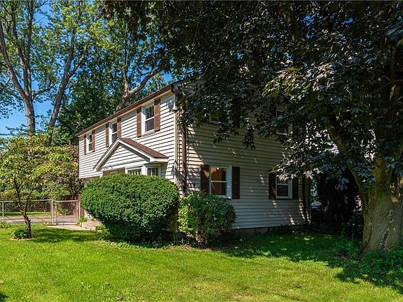 Fenced in front and side yard