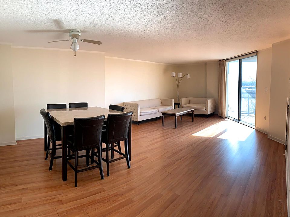 Living Room Dining Room Area with Balcony