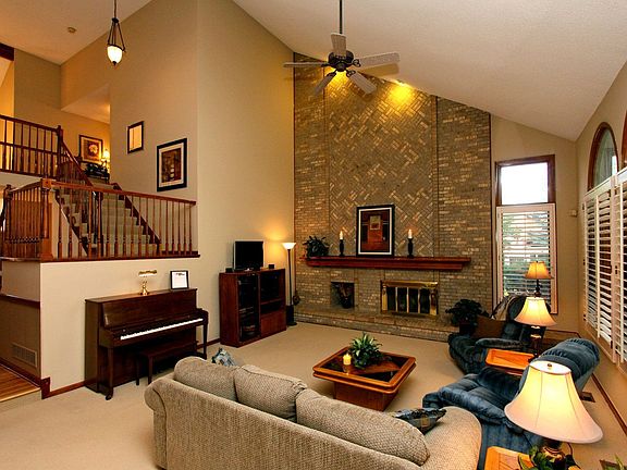 Vaulted family room with plantation shutters!