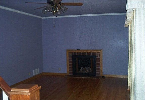 Living Room.. Now with cream colored walls and updated fireplace