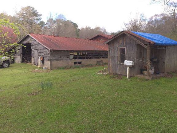 Barn and child’s playhouse 