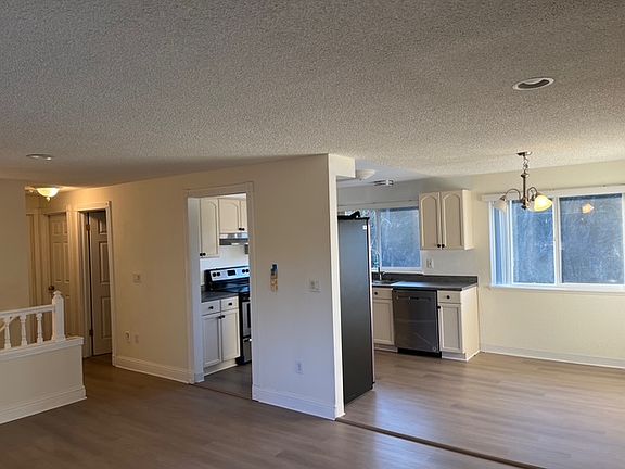 upstairs kitchen, eating area, living room