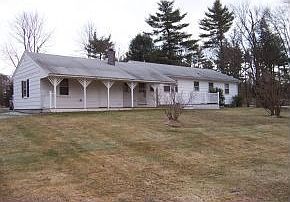 Rear features deck across back