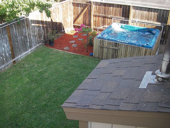 Part of the lawn & hot tub