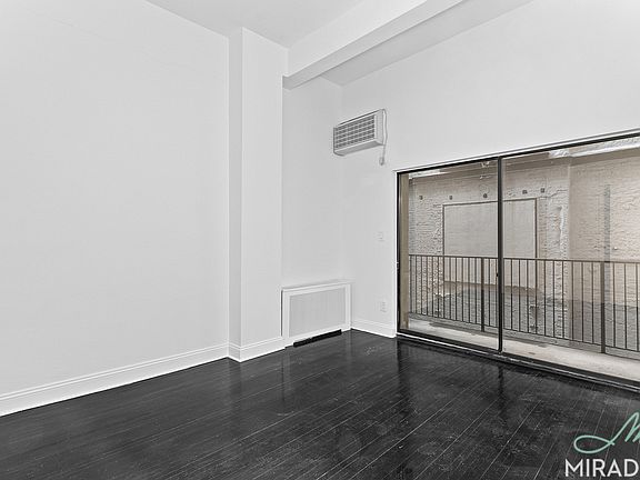 5th image of 10 E 13th St APT 2F