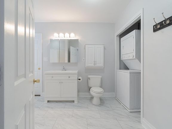 Large bathroom with washer/dryer