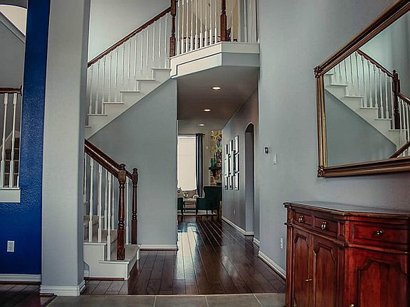 This spectacular foyer and staircase offer an amazing first impression. You will be impressed with t